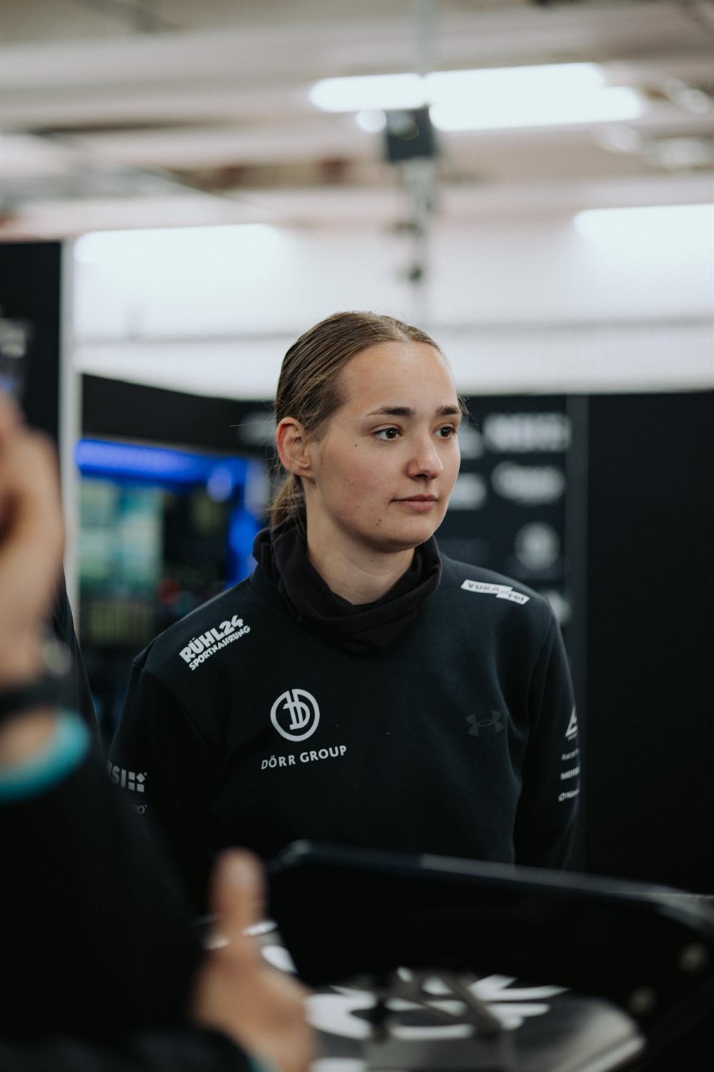 Mandy Paschen in Dörr Group team wear in the pit